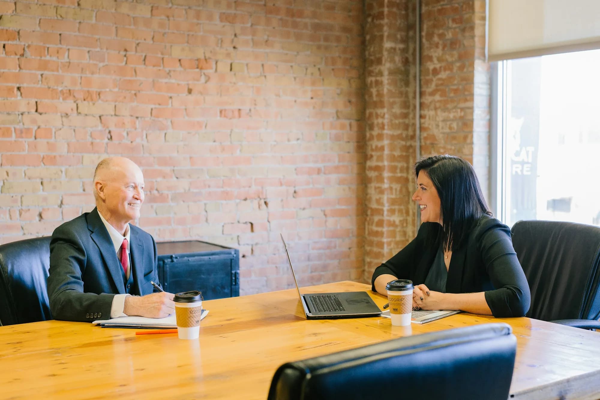 A professional advisor reviewing information with a client